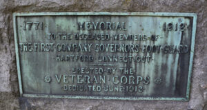 Photo of plaque on the south side of Governor's Foot Guard Boulder, Monument #001, whose inscription reads: "1771 1912: Memorial to the deceased members of the First Company Governors Foot Guard Hartford, Connecticut. Erected by the Veteran Corps, dedicated June 1912"