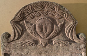 Photo of tympanum (top) of headstone for Mrs. Lucinda Patten,d. 1789