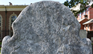 Image of the tope of headstone at map location #084