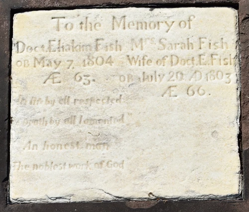 Image of the tablestone for Doct. Eliakim Fish & Mrs. Sarah Fish: "To the Memory of / Doct. Eliakim Fish Mrs. Sarah Fish / OB May 7, 1804 Wife of Doct. E. Fish / AE 63. OB July 20 AD 1803 / AE 66. / In life by all respected / Death by all lamented / An honest man / The noblest work of God."