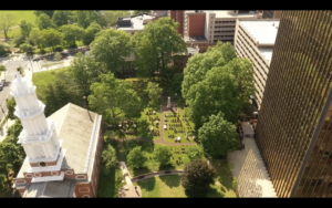 Still image of aerial drone video of ancient burying ground, Hartford, showing Center Church & Gold Building