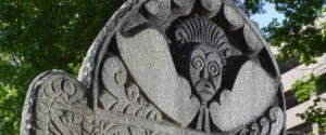 Photo of Marker #600's tympaneum, an angel's head decorative style