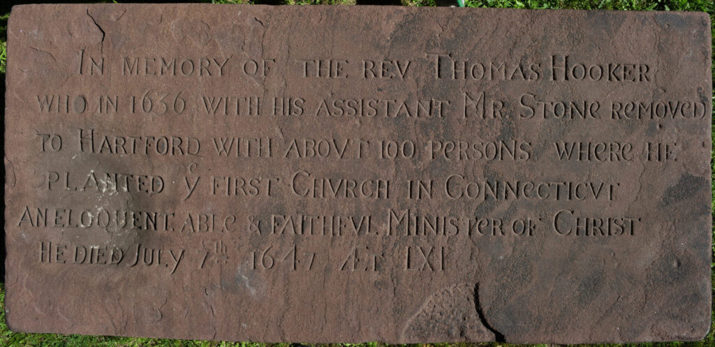The inscription on the tablestone (marker #441) for Reverend Thomas Hooker is shown: IN MEMORY OF THE REV. THOMAS HOOKER / WHO IN 1636 WITH HIS ASSISTANT MR. STONe ReMOVeD TO HARTFORD WITH ABOUT 100 PeRSONS WHeRe HE / PLANTED ye FIRST CHURCH IN CONNeCTICUT / AN ELOQUENT. ABLe & FAITHFUL MINISTeR OF CHRIST / HE DIED JULY 7th 1647 AET LXI