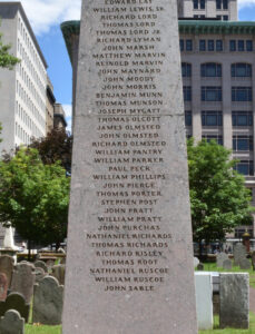 photo of side of Founder's Monument with text on it